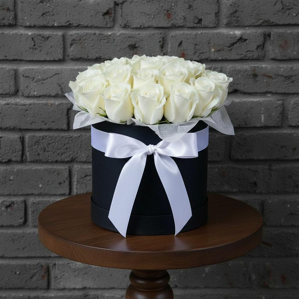 Цветочная композиция из Розы в шляпной коробке в Томмоте